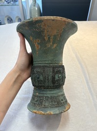 A Chinese archaic bronze wine vessel with taotie design, 'zun 尊', Western Zhou