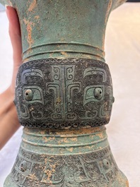 A Chinese archaic bronze wine vessel with taotie design, 'zun 尊', Western Zhou