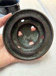 A Chinese bronze tripod censer and cover, Sui/Tang