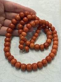 A Chinese red coral necklace, 19th C.