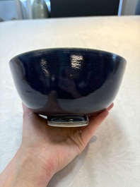 A pair of Chinese blue-glazed 'Hatcher Cargo' bowls with incised dragons, Transitional period