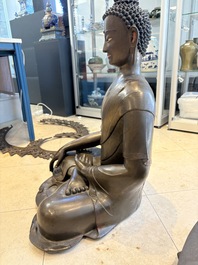 An exceptionally large Nepalese bronze figure of Buddha, 19th C.