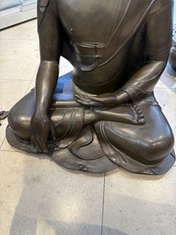 An exceptionally large Nepalese bronze figure of Buddha, 19th C.