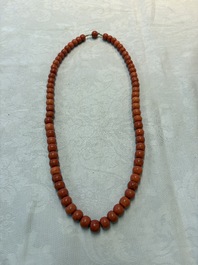 A Chinese red coral necklace, 19th C.