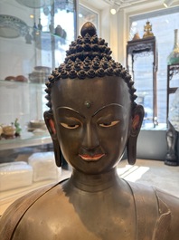 An exceptionally large Nepalese bronze figure of Buddha, 19th C.