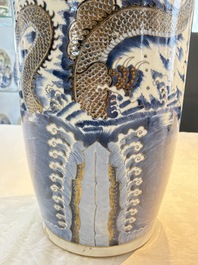 A large Chinese gilt-decorated blue and white 'dragon' rouleau vase, 19th C.