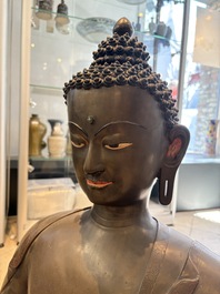 An exceptionally large Nepalese bronze figure of Buddha, 19th C.
