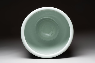 A fine Chinese blue, white and copper-red 'lotus scroll' fish bowl, Qianlong