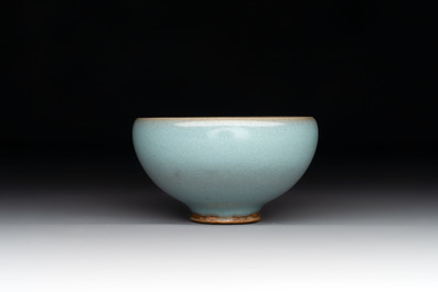 A small Chinese blue-glazed 'jun' tea cup with a wooden box, Song/Yuan