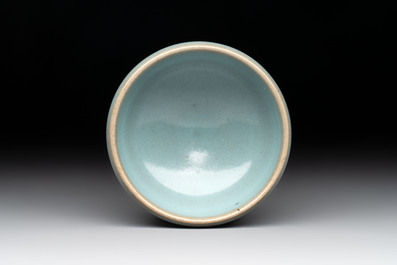 A small Chinese blue-glazed 'jun' tea cup with a wooden box, Song/Yuan