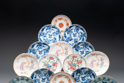 A collection of 14 Chinese blue, white and famille rose cups and 22 saucers, 18/19th C.