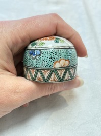 A pair of famille verte-style ovoid jars and covers, Samson, Paris, 19th C.