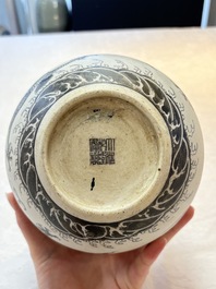 A Chinese black-enamelled  biscuit 'dragon' vase, Qianlong mark, 19th C.