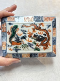 A Chinese wucai covered box, a blue and white ewer, a famille rose covered box and a plate, Wanli, Kangxi and Guangxu mark, 19/20th C.