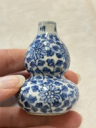 A Chinese blue and white double-gourd snuff bottle and a huali snuff bottle, Xuande and Qianlong mark, 18th C.