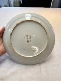 A Chinese famille rose yellow-ground 'dragon' plate and a 'lantern festival' plate, Guangxu marks and of the period