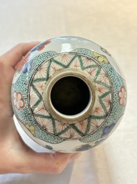 A pair of famille verte-style ovoid jars and covers, Samson, Paris, 19th C.