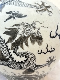A Chinese black-enamelled  biscuit 'dragon' vase, Qianlong mark, 19th C.