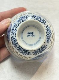 A Chinese blue and white reticulated double-walled cup, pearl mark, Kangxi