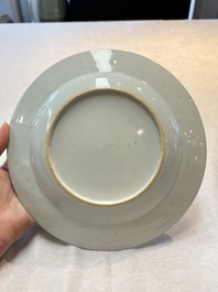 A Chinese famille rose plate depicting a scene from a fable by La Fontaine and a 'Shepherds' plate, Qianlong