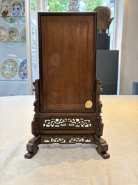 A Chinese laque burgaut&eacute; and hongmu table screen, Qing