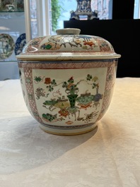 A Chinese famille verte 'antiquities' bowl and cover, Kangxi
