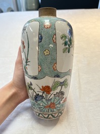 A pair of famille verte-style ovoid jars and covers, Samson, Paris, 19th C.