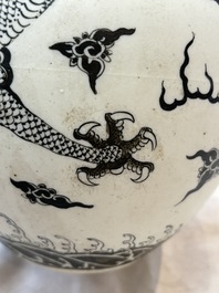 A Chinese black-enamelled  biscuit 'dragon' vase, Qianlong mark, 19th C.
