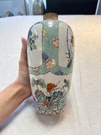A pair of famille verte-style ovoid jars and covers, Samson, Paris, 19th C.