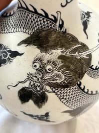 A Chinese black-enamelled  biscuit 'dragon' vase, Qianlong mark, 19th C.