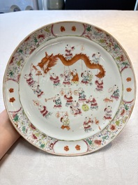 A Chinese famille rose yellow-ground 'dragon' plate and a 'lantern festival' plate, Guangxu marks and of the period