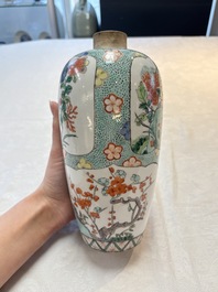 A pair of famille verte-style ovoid jars and covers, Samson, Paris, 19th C.