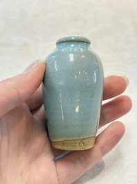 A Chinese blue-glazed 'jun' miniature vase with a wooden box, Song/Yuan