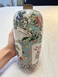 A pair of famille verte-style ovoid jars and covers, Samson, Paris, 19th C.