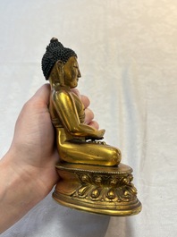 A fine Sino-Tibetan gilt-bronze figure of Buddha Shakyamuni, 17th C.