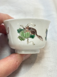 A pair of Chinese famille verte 'squirrels and melons' cups, Chenghua mark, Kangxi