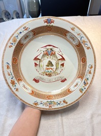 A large Chinese famille rose armorial basin with the arms of Lambert for the English market, Kangxi/Yongzheng, ca. 1722