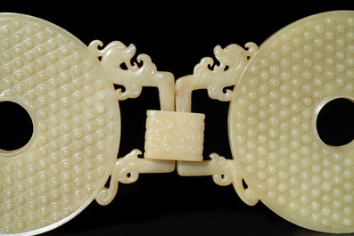 An imperial Chinese yellow jade 'dragon and phoenix' twin 'bi' disc, Qing