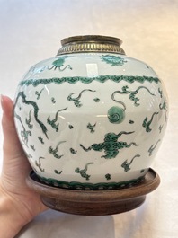 A Chinese green-enamelled 'dragon' jar mounted as a lamp, 18/19th C.