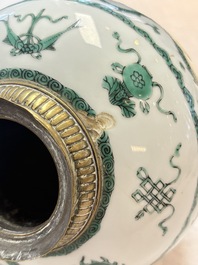 A Chinese green-enamelled 'dragon' jar mounted as a lamp, 18/19th C.