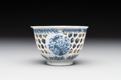 A Chinese blue and white reticulated double-walled cup, pearl mark, Kangxi