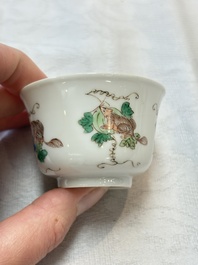 A pair of Chinese famille verte 'squirrels and melons' cups, Chenghua mark, Kangxi