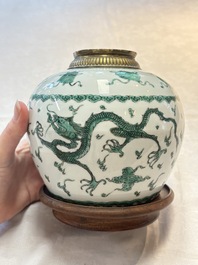A Chinese green-enamelled 'dragon' jar mounted as a lamp, 18/19th C.
