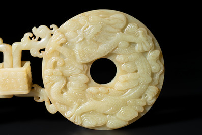 An imperial Chinese yellow jade 'dragon and phoenix' twin 'bi' disc, Qing