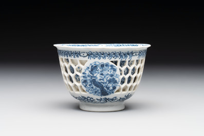 A Chinese blue and white reticulated double-walled cup, pearl mark, Kangxi