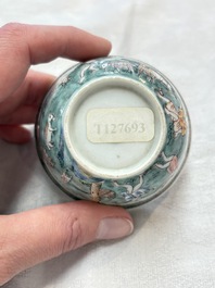 A fine Chinese famille rose 'apple pickers' cup and saucer, Yongzheng