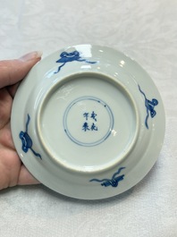 Five Chinese blue and white 'elegant beauty and boy' cups and saucers, Chenghua mark, Kangxi