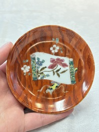 A Chinese famille rose blue-ground cup and saucer, and a 'faux-bois' cup and saucer, Yongzheng/Qianlong