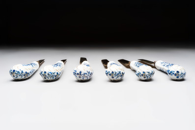 A set of six knives with Chinese gilt and blue-enamelled porcelain handles, in a case, Qianlong