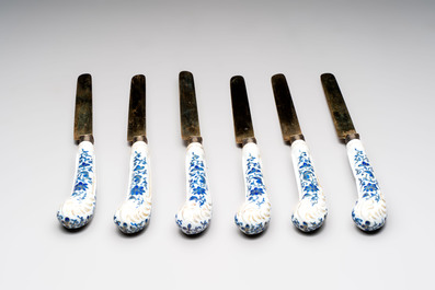 A set of six knives with Chinese gilt and blue-enamelled porcelain handles, in a case, Qianlong